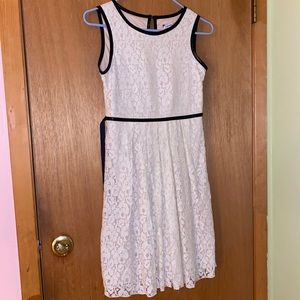 Off-white/cream dress with black lining